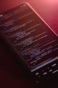 close up of code on smartphone screen