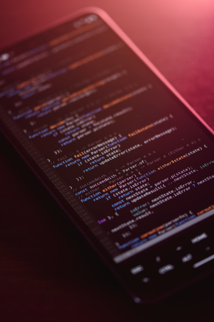 close up of code on smartphone screen