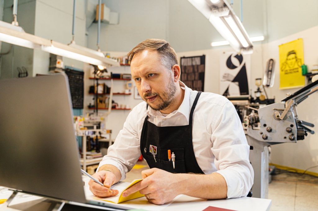 a man using a laptop