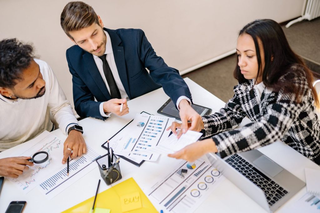 businesspeople brainstorming in a meeting
